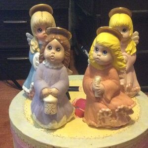 Vintage set of 4 angels holding lanterns . 9-10 inches